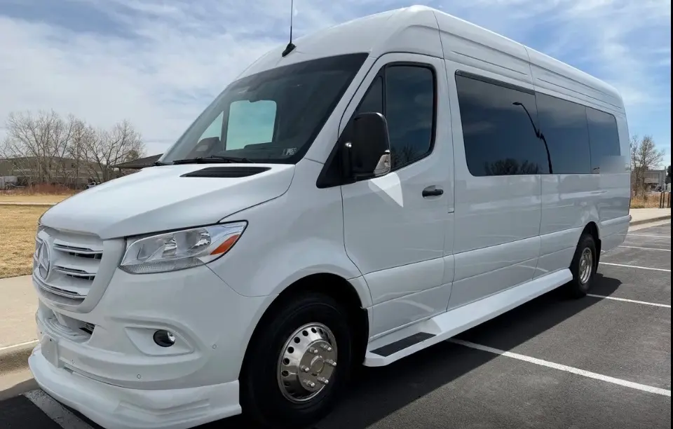 Fort Collins 16 passenger white Sprinter limo bus