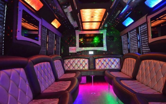 Party bus lounge with LED ceiling – Fort Collins limo service
